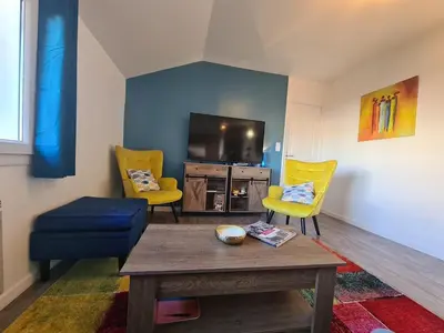 Télévision ou salle de divertissement dans l'établissement Longère au coeur de Reims complètement rénovée