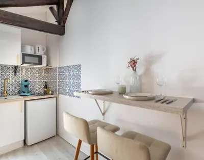 Cuisine ou kitchenette dans l'établissement Le Douillet