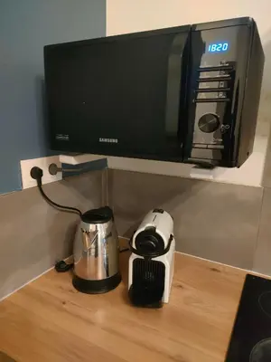 Cuisine ou kitchenette dans l'établissement chambre 14m2 calme et parking privé