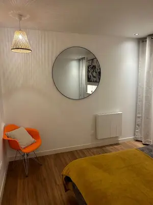 Un ou plusieurs lits dans un hébergement de l'établissement Sublime appartement Rémois