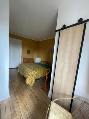 Un ou plusieurs lits dans un hébergement de l'établissement Joli appartement secteur Mézières