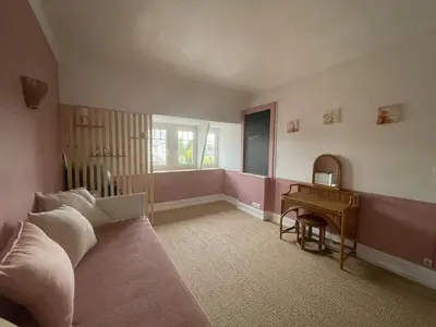 Coin salon dans l'établissement Joli appartement secteur Mézières