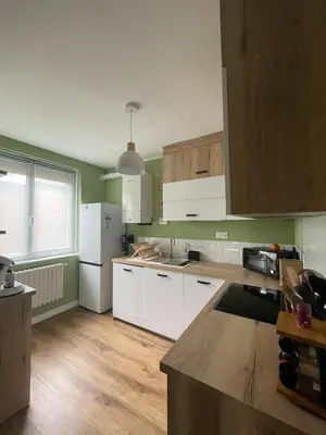Cuisine ou kitchenette dans l'établissement Joli appartement secteur Mézières