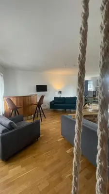 Coin salon dans l'établissement Le 72 - Bohemian Chic - 20 min from Disneyland Paris