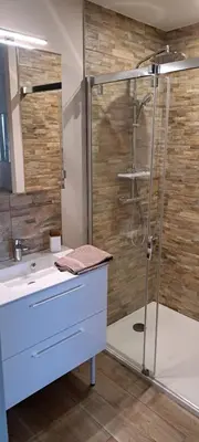 Salle de bains dans l'établissement Maison Au 14