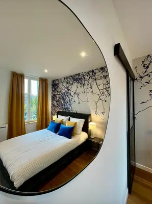 Un ou plusieurs lits dans un hébergement de l'établissement Luxury Family Stay & 20 min Disney Paris