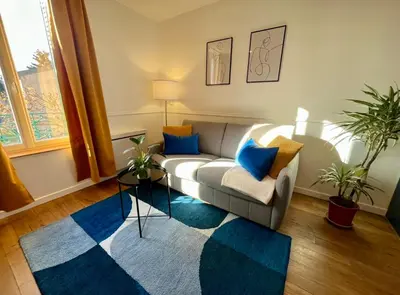 Coin salon dans l'établissement Luxury Family Stay & 20 min Disney Paris