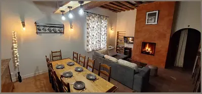 Coin salon dans l'établissement Maison champètre avec 8 couchage à 35' disney proche studio cinéma TSF 77 au milieu d'un corps de ferme