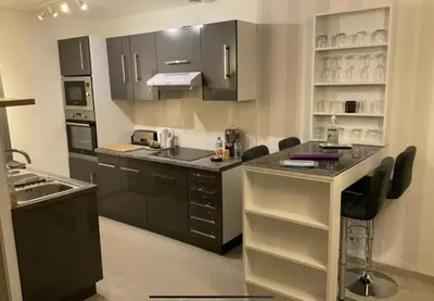 Cuisine ou kitchenette dans l'établissement 3P près de Disney