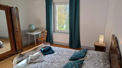 Un ou plusieurs lits dans un hébergement de l'établissement brouillon Maison de famille, 4 chambres, 10 couchages, piscine 1N pb nb chambres