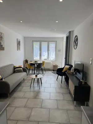 Coin salon dans l'établissement Gîte des Prés
