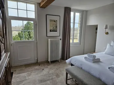Un ou plusieurs lits dans un hébergement de l'établissement Château de la Follie Le Bourgot