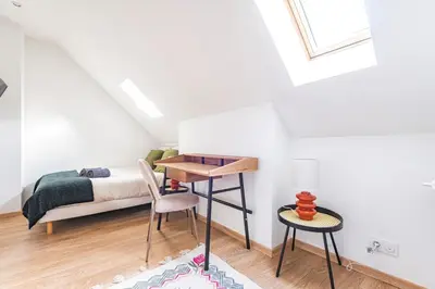 Un ou plusieurs lits dans un hébergement de l'établissement Le Sarrail - Hypercentre et 12 Couchages