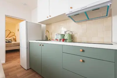 Cuisine ou kitchenette dans l'établissement Le Panorama - Hypercentre - 8 Personnes