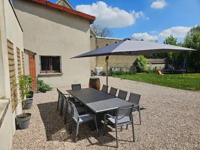 Jardin de l'établissement Gîte En bord de rivière