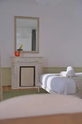 Un ou plusieurs lits dans un hébergement de l'établissement Aloe Vera - 3 chambres