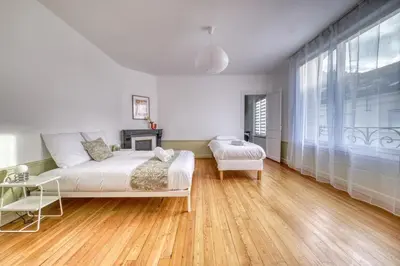 Un ou plusieurs lits dans un hébergement de l'établissement Aloe Vera - 3 chambres