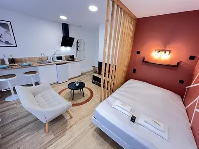 Un ou plusieurs lits dans un hébergement de l'établissement Paris 21 - Studio charmant proche du centre-ville
