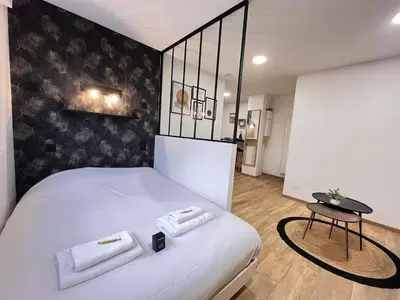 Un ou plusieurs lits dans un hébergement de l'établissement Paris 24 - Studio calme, cosy proche centre Reims