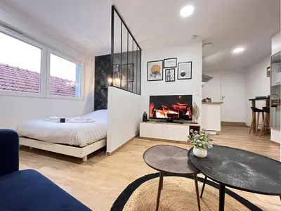 Un ou plusieurs lits dans un hébergement de l'établissement Paris 24 - Studio calme, cosy proche centre Reims