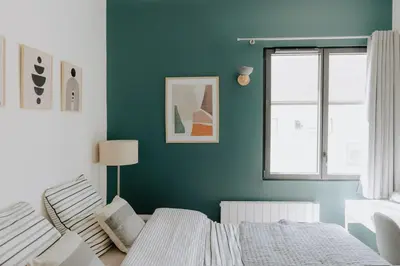 Un ou plusieurs lits dans un hébergement de l'établissement Immi Immobilier - Studio Cozy & Équipé