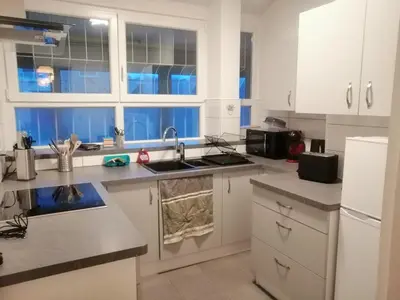 Cuisine ou kitchenette dans l'établissement Appartement Lumineux