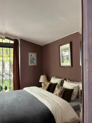 Un ou plusieurs lits dans un hébergement de l'établissement Le Clos des Lilas