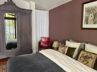 Un ou plusieurs lits dans un hébergement de l'établissement Le Clos des Lilas