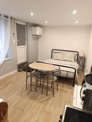 Coin salon dans l'établissement Studio charmant