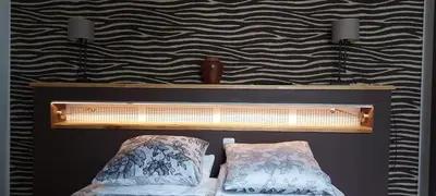 Un ou plusieurs lits dans un hébergement de l'établissement Le Gobelin Champenois - Appartement - Reims