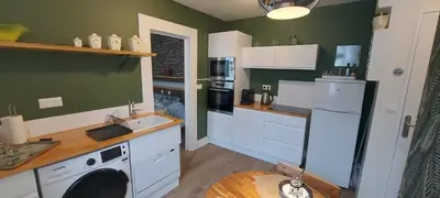 Cuisine ou kitchenette dans l'établissement Le Gobelin Champenois - Appartement - Reims
