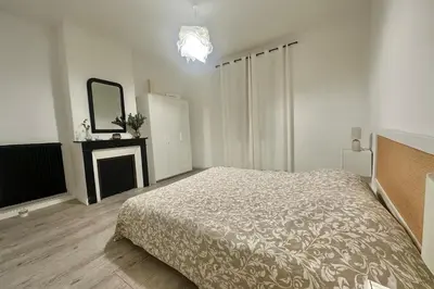 Un ou plusieurs lits dans un hébergement de l'établissement Appartement lumineux proche hyper-centre