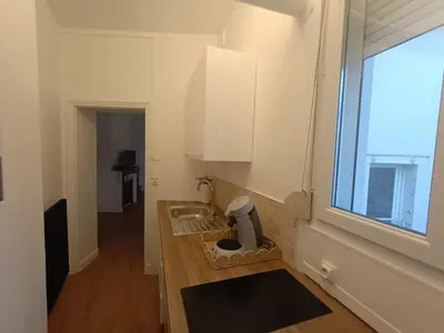 Cuisine ou kitchenette dans l'établissement Appartement lumineux proche hyper-centre