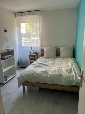 Un ou plusieurs lits dans un hébergement de l'établissement Apartment close to Place Luton