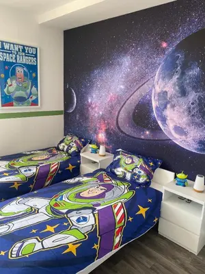 Un ou plusieurs lits dans un hébergement de l'établissement Chez Woody & Buzz - 10 minutes Disneyland Paris