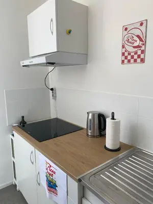 Cuisine ou kitchenette dans l'établissement Chez Woody & Buzz - 10 minutes Disneyland Paris