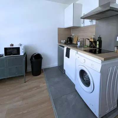 Cuisine ou kitchenette dans l'établissement Combo centre-ville - 8 pers - 3 chambres avec salle de bain