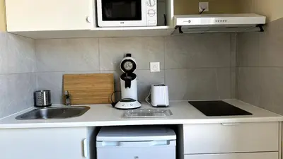 Cuisine ou kitchenette dans l'établissement Pommery