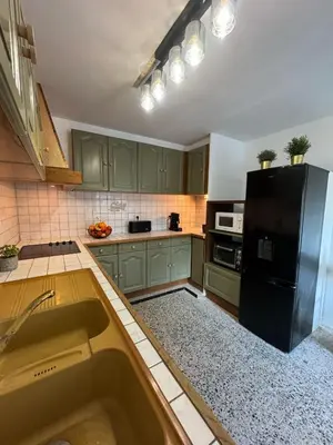 Cuisine ou kitchenette dans l'établissement Gîte Baytso