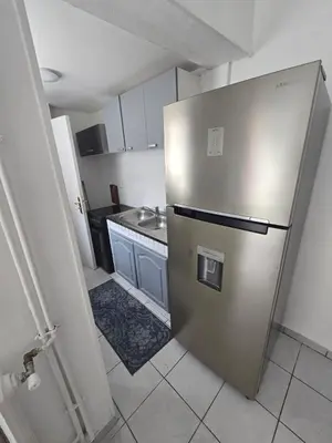 Cuisine ou kitchenette dans l'établissement Alfa location