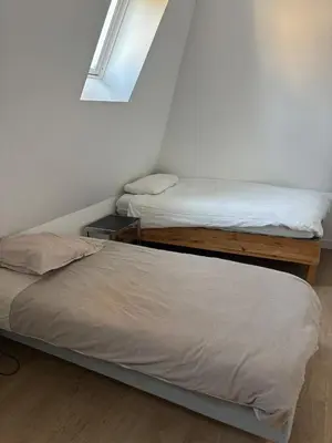 Un ou plusieurs lits dans un hébergement de l'établissement Bel appartement indépendant à proximité Château de Sedan