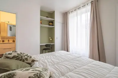 Un ou plusieurs lits dans un hébergement de l'établissement Central fully equiped apartment near Cathedral