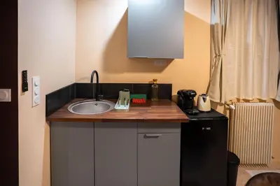 Cuisine ou kitchenette dans l'établissement Terres de Soleil - Bohème Chic en cœur St Quentin