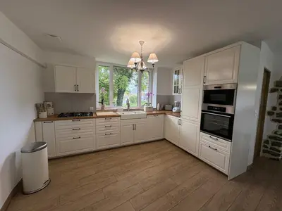 Cuisine ou kitchenette dans l'établissement La ferme du bon vieux temps