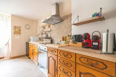 Cuisine ou kitchenette dans l'établissement La Prima Mora maison médiévale au coeur du château