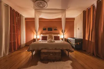 Un ou plusieurs lits dans un hébergement de l'établissement La Prima Mora maison médiévale au coeur du château