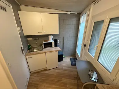 Cuisine ou kitchenette dans l'établissement Studio centre ville à 10 min de la gare