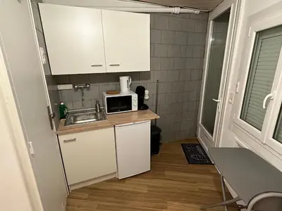 Cuisine ou kitchenette dans l'établissement Studio centre ville à 10 min de la gare