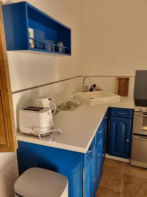 Cuisine ou kitchenette dans l'établissement Gite du Bois de Lord