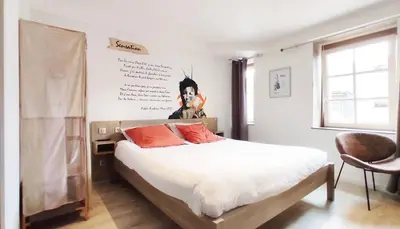 Un ou plusieurs lits dans un hébergement de l'établissement Appartement cosy à Charleville-Mézières, 60 m² avec vue